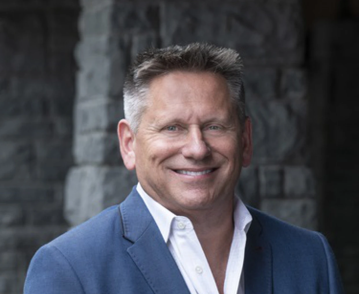 Smiling man in blue suit